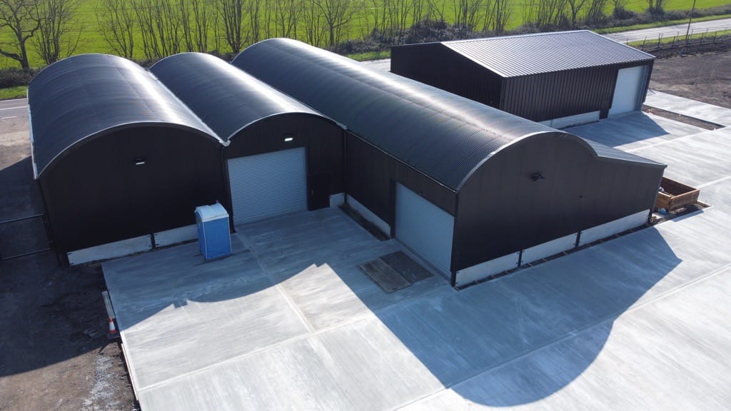 Tripe aspect barn with curved roof post refurbishment